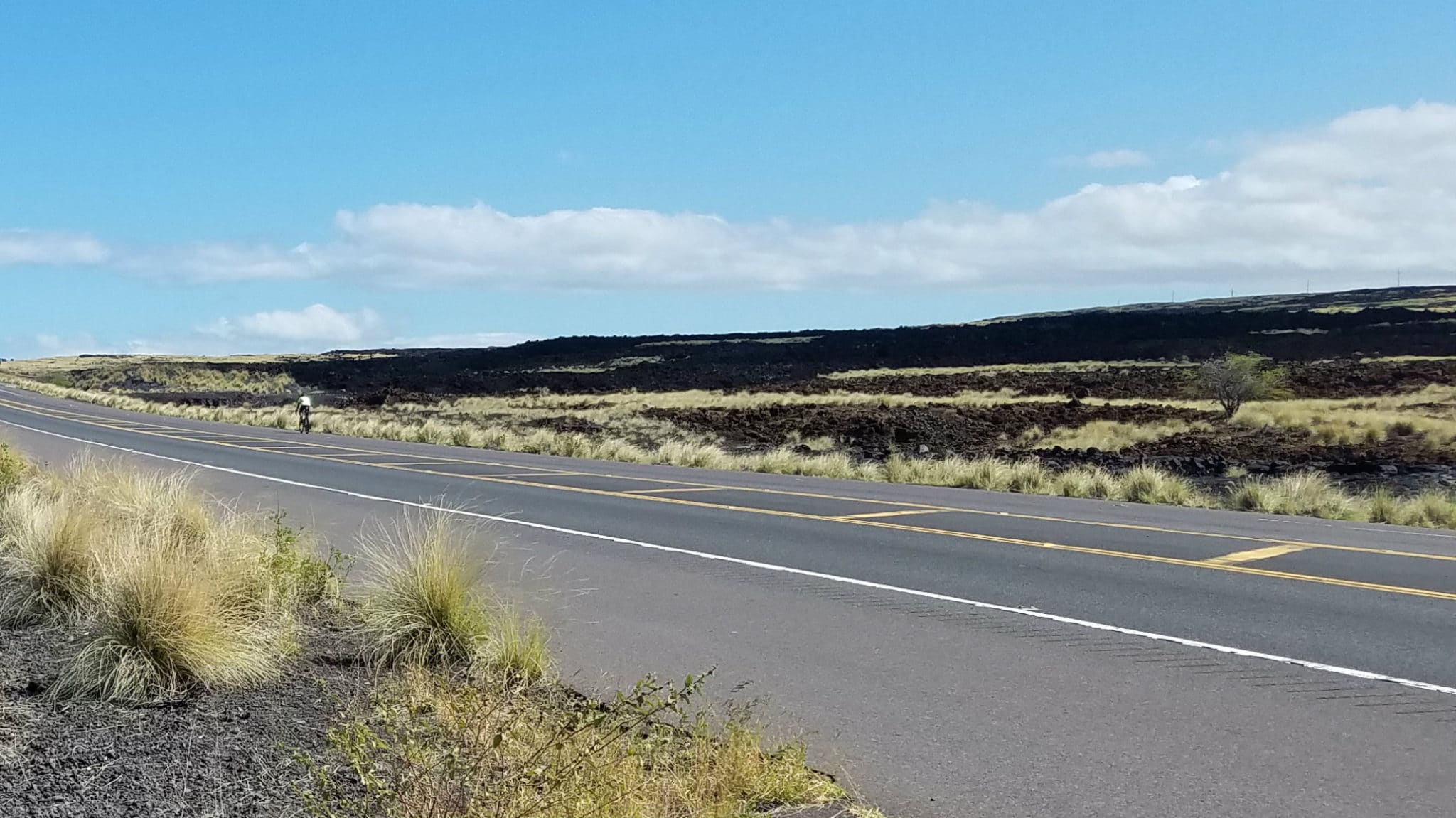 biking along the Queen Ka'ahumanu Highway near Kona, Hawaii