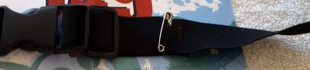 Race number belt with safety pin