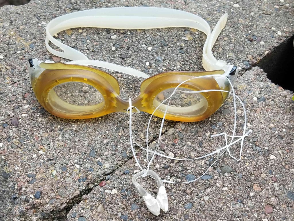 Tyr-Ergo-nose-clip-attached-to-goggles-with-long-connection