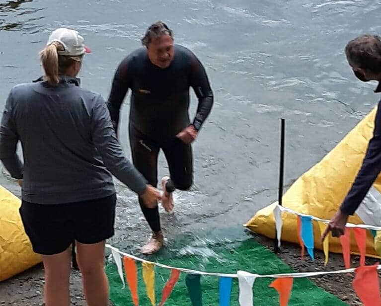 Craig Cross exiting the swim at Whidbey Island Triathlon in July 2021.