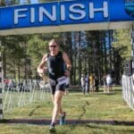 confidence in triathlon comes from crossing the finish line and completing a triathlon