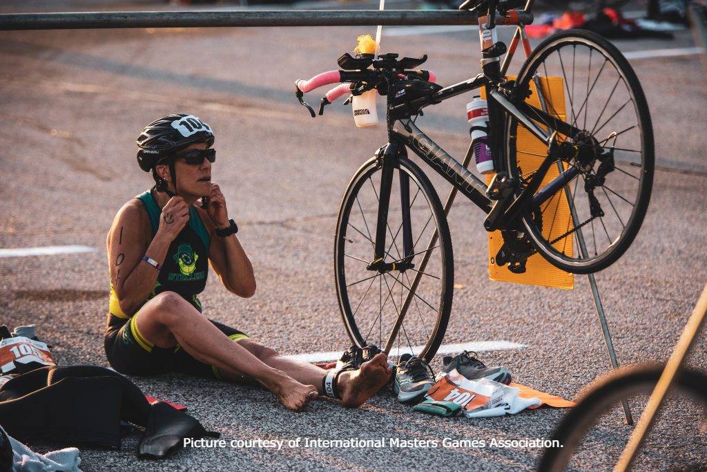 Senior triathlete in transition from the bike to run at 2024 Pan American Games