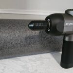 foam rolling vs massage gun comparison