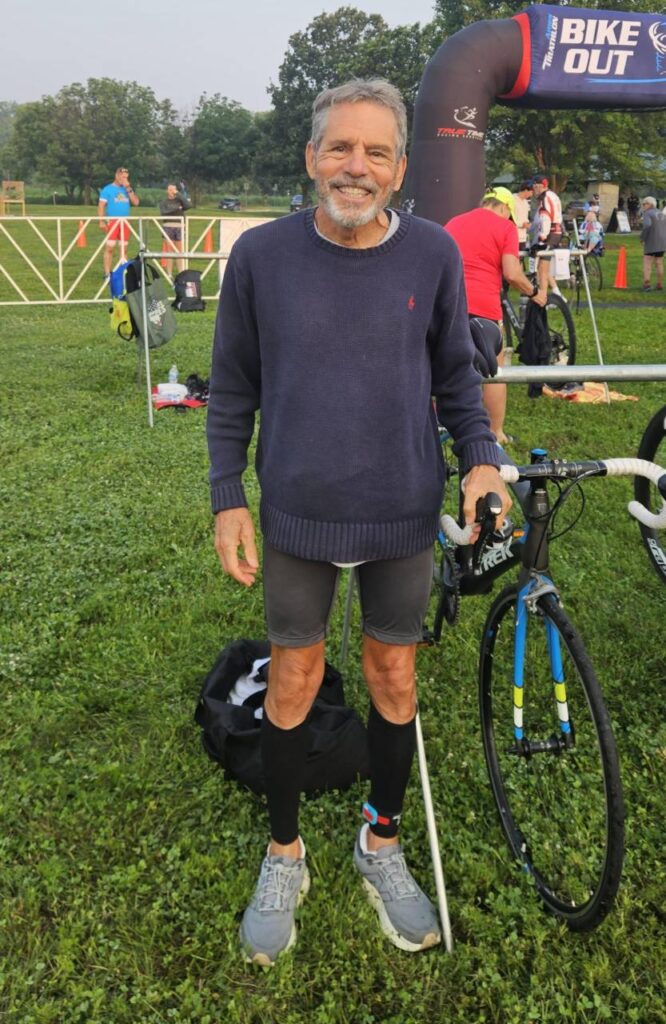 Joe Simonetta awaits the start of the 2025 National Senior Games triathlon.
