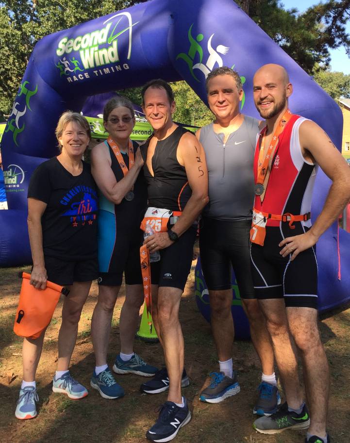 Nikki Austin smiles after a triathlon, reflecting her continued enthusiasm for the sport.